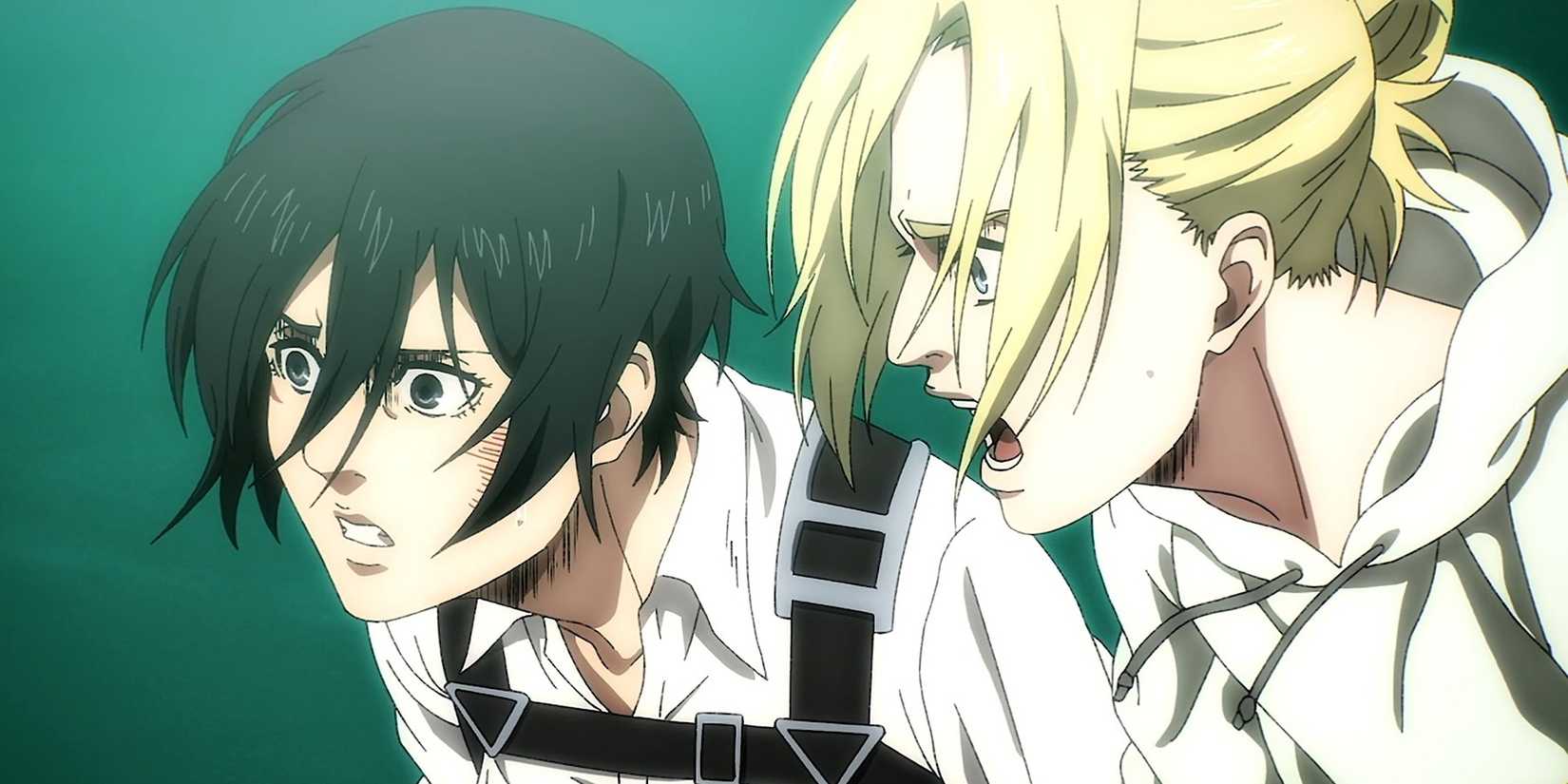 Mikasa and Annie look at something off to the side.