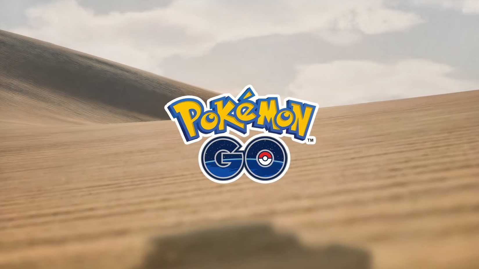 Pokemon GO logo in sand desert screenshot