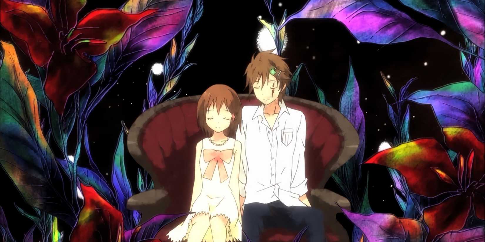 Utsutsu and Yume sitting together on the sofa during the opening of Chrysalis.