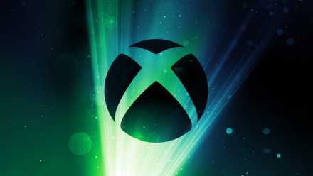 Xbox logo in black with blue and green shining through