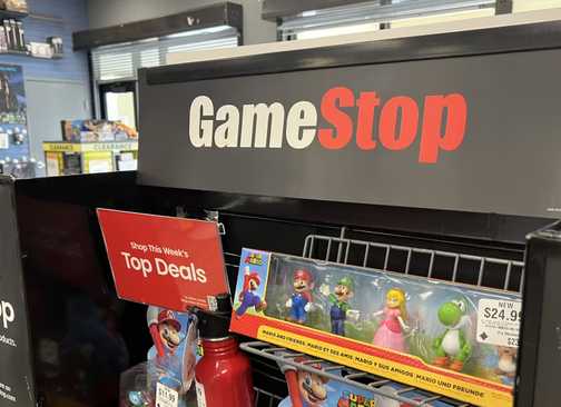 GameStop store display shelf with Mario