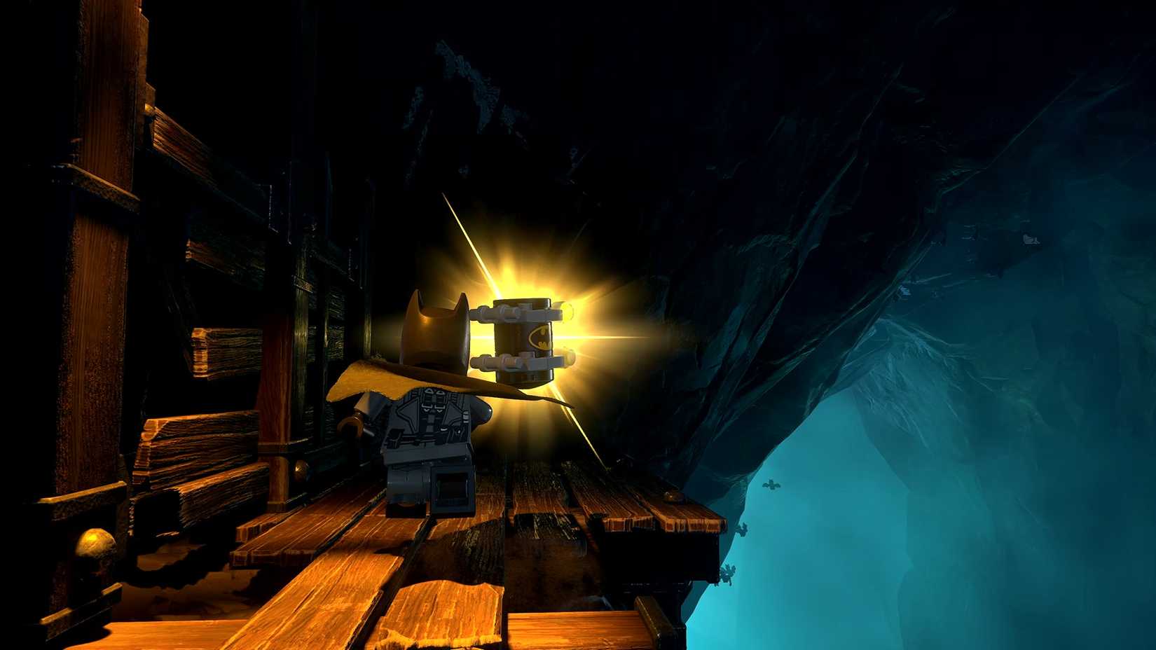 Batman approaching a collectible on a bridge in LEGO Batman Legacy of the Dark Knight
