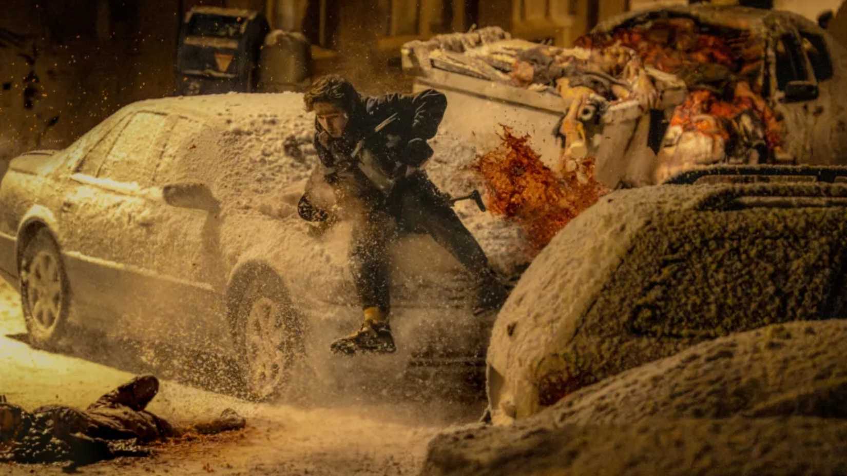 Zombies falling in the snow in Resident Evil
