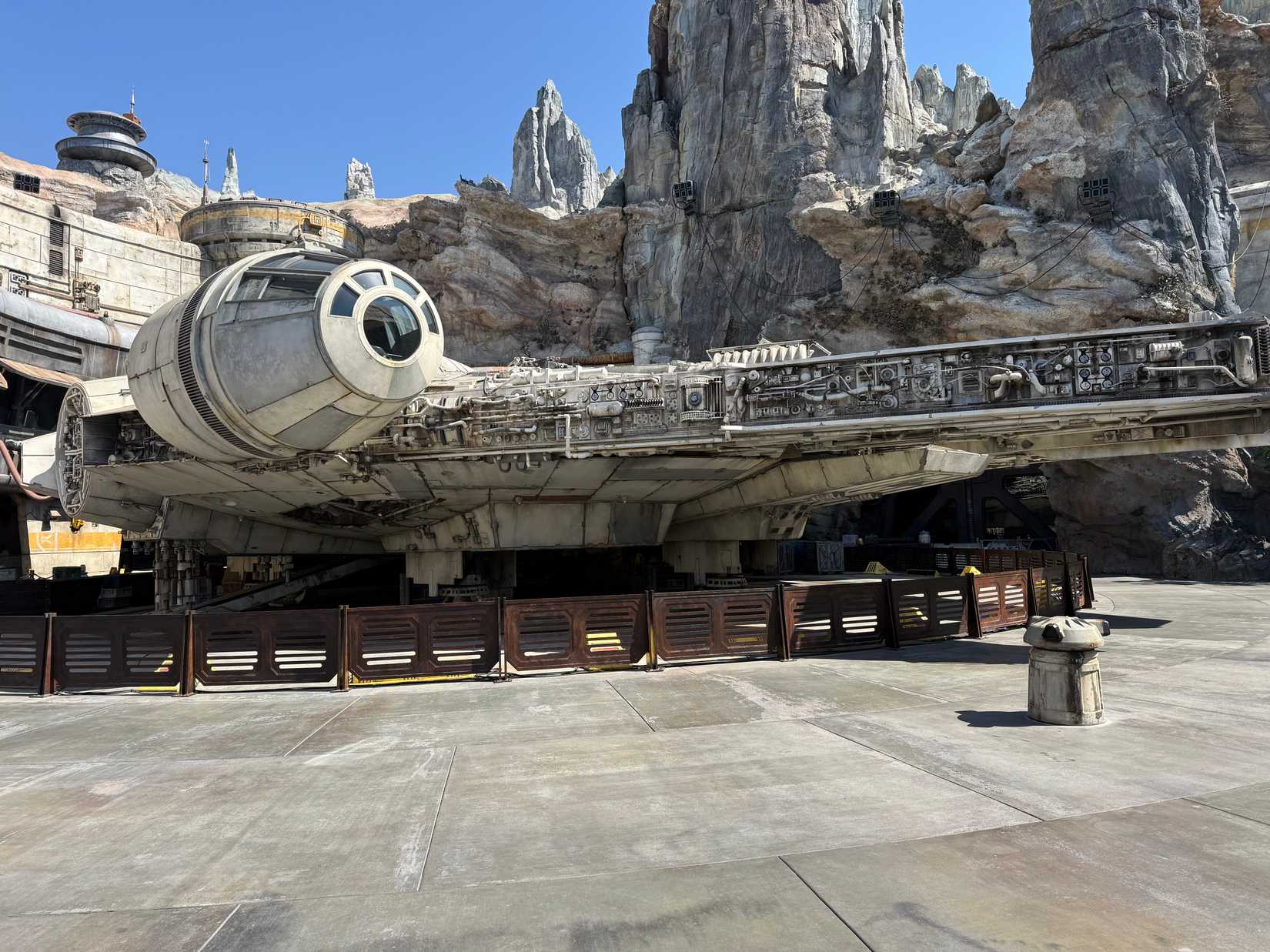 the smugglers are running mando - the millennium falcon outside