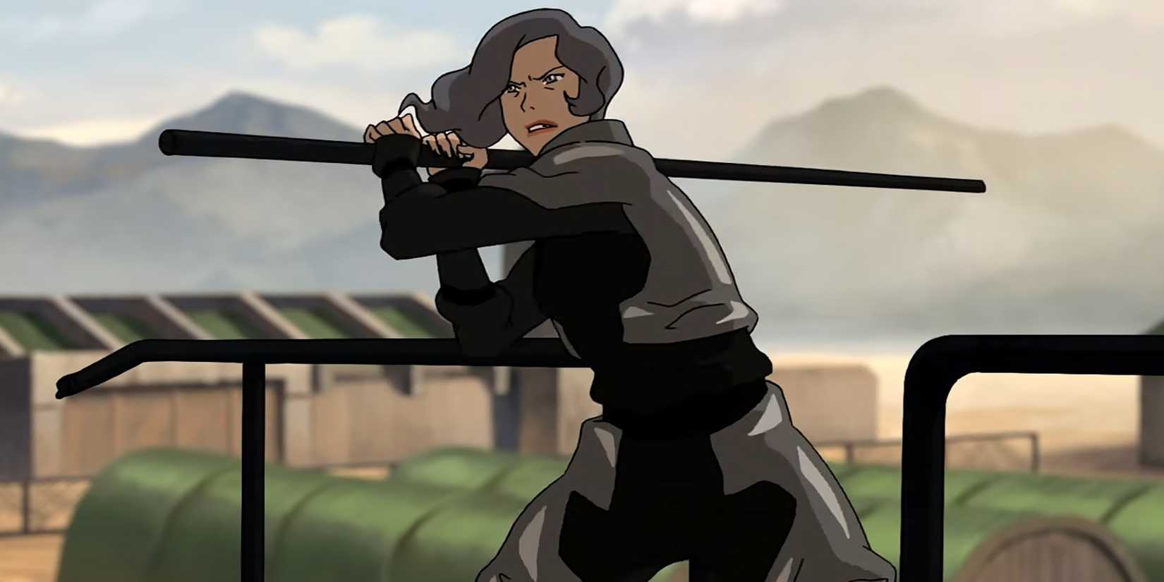 Suyin Beifong fights with a metal rod.