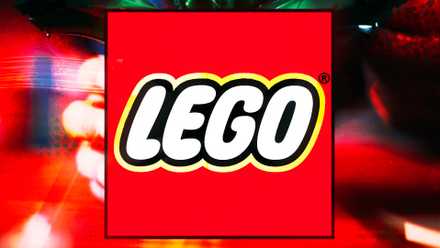 There's a bright red LEGO logo in front of an abstract light shape.