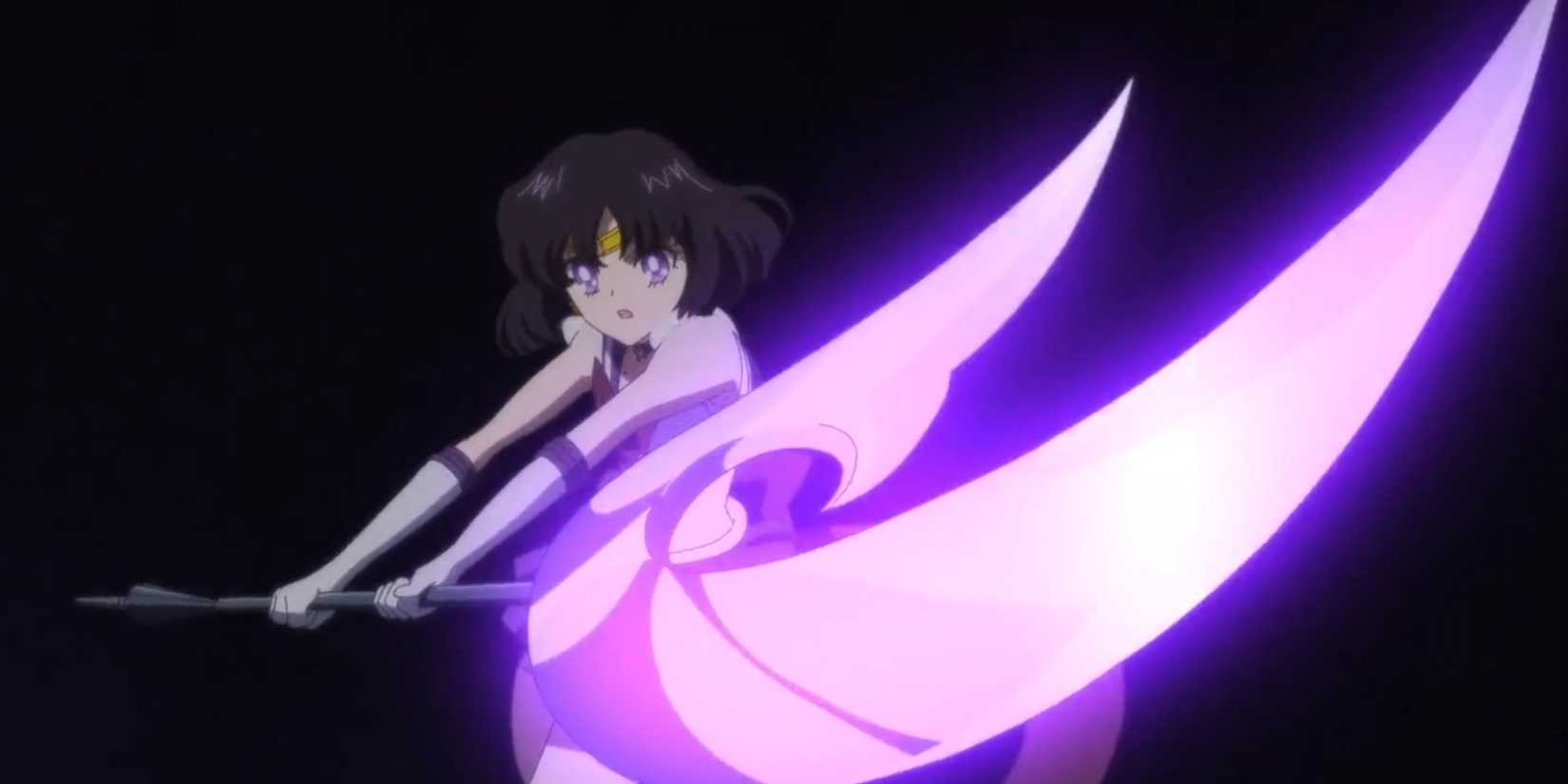 Sailor Saturn charges her glaive to attack an opponent with destructive energy.