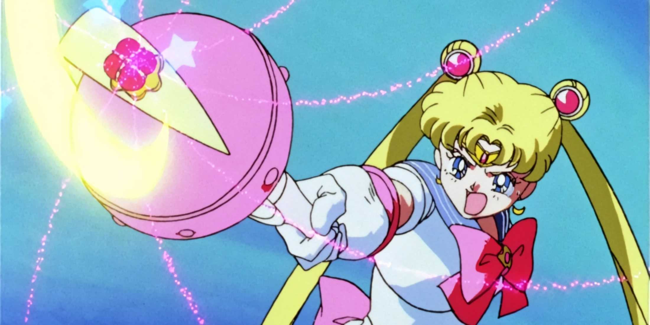 Serena fires the spiral attack from her Spiral Heart Moon Rod.
