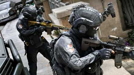 A pair of Call of Duty: Modern Warfare 4 operators holding ground from a high position.