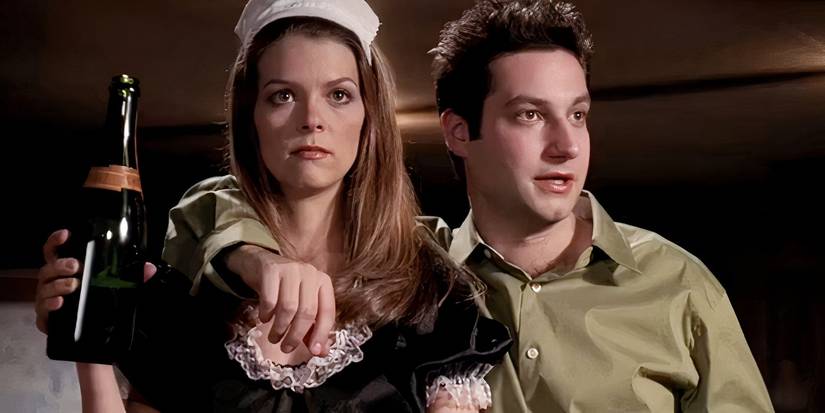 Warren Mears the robot in Buffy the Vampire Slayer carrying his arm around April