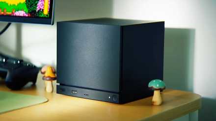 Steam Machine console on desk