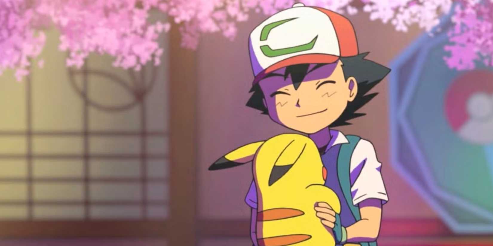 Ash and Pikachu celebrate their victory by hugging each other. 