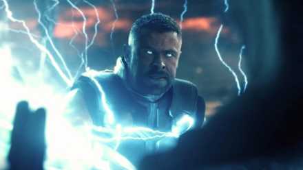 Thor with glowing eyes and surrounded by lightning as he charges at Doctor Doom