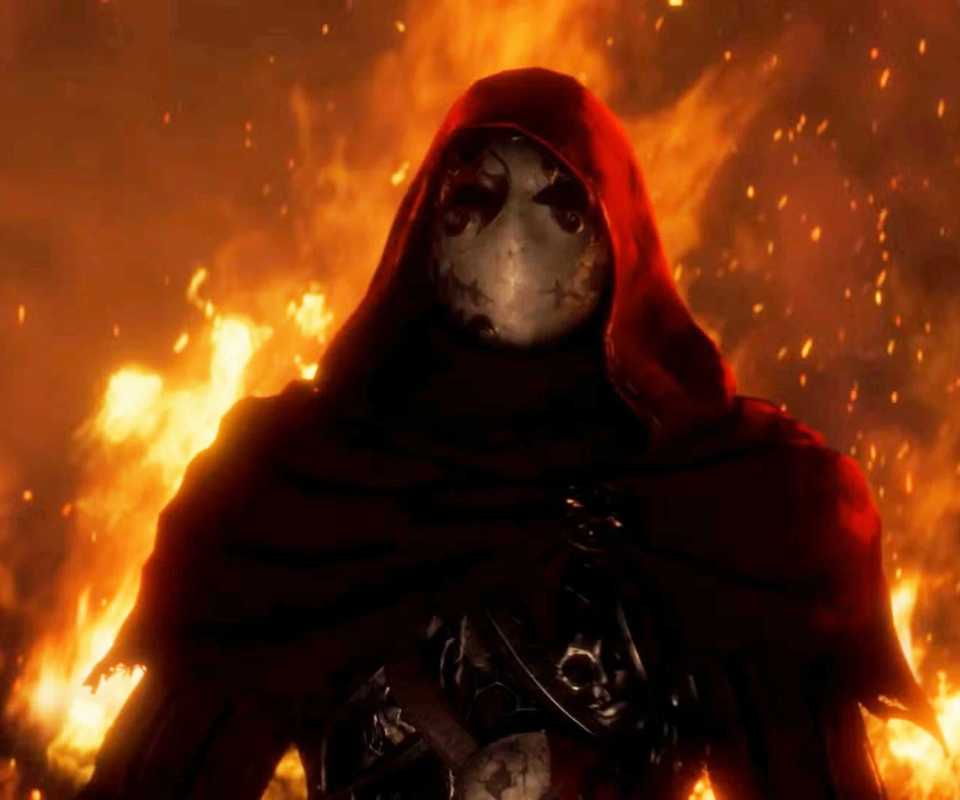 A shot of Jack of Blades from the Fable reboot in front of a bunch of flames