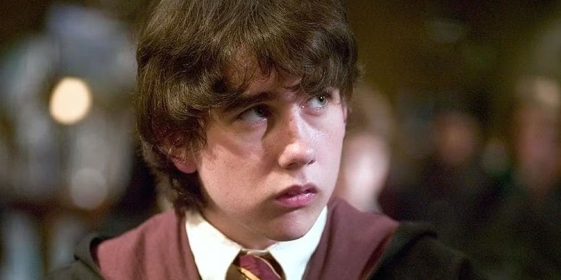 Neville in his Hogwarts uniform in Harry Potter