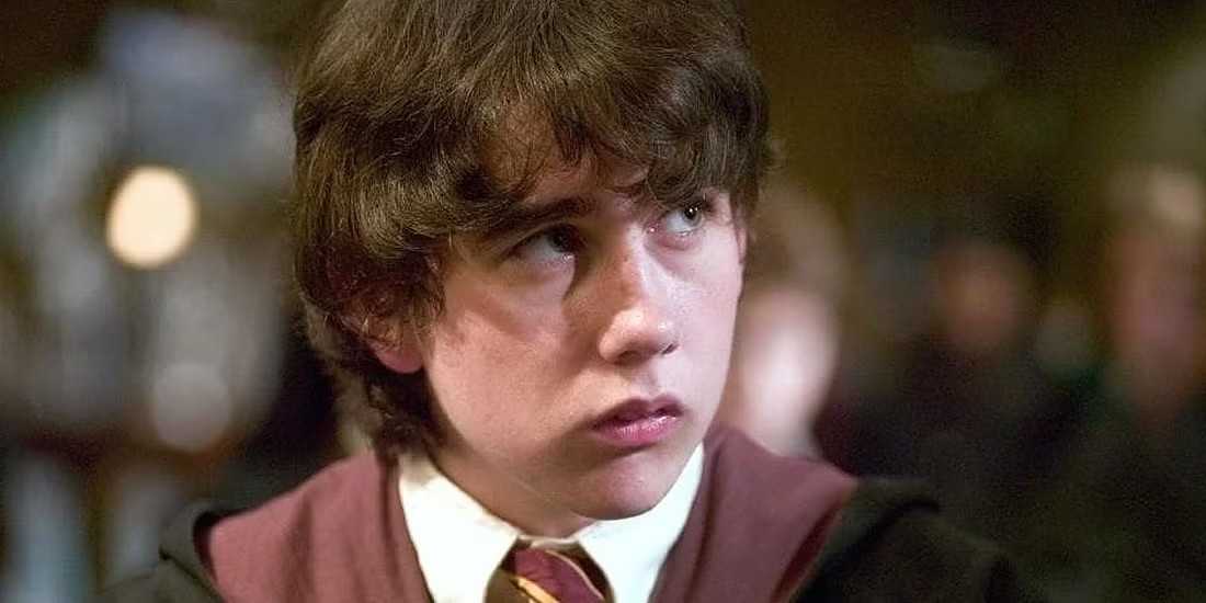 Neville in his Hogwarts uniform in Harry Potter