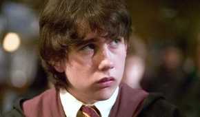 Neville in his Hogwarts uniform in Harry Potter