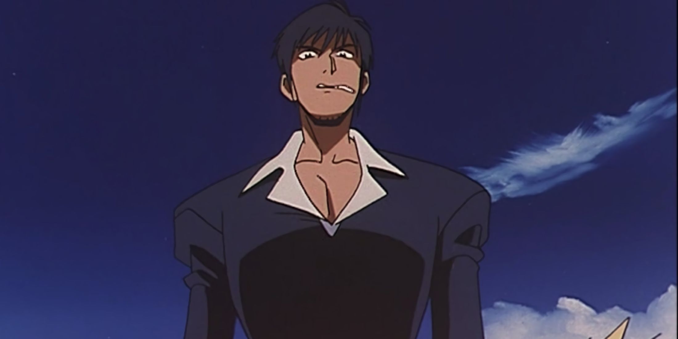 Nicholas glaring at Vash while the other man pretends to be injured.