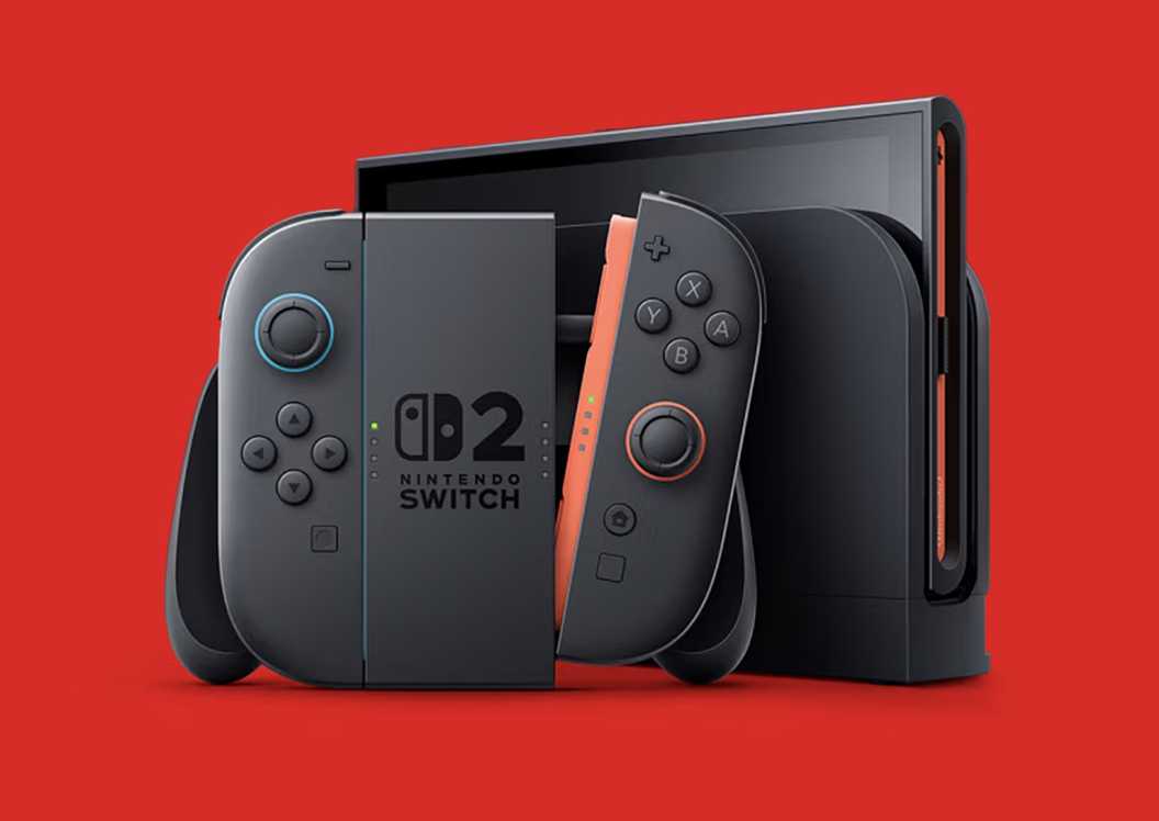 Nintendo Switch 2 dock and Joy-Con on red background