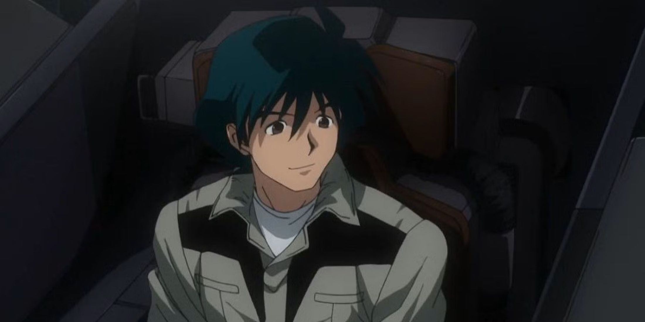 Shiro smiling inside his Gundam as he prepares to go out on a mission.