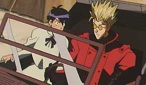 Vash and Meryl driving as the woman reprimands him.