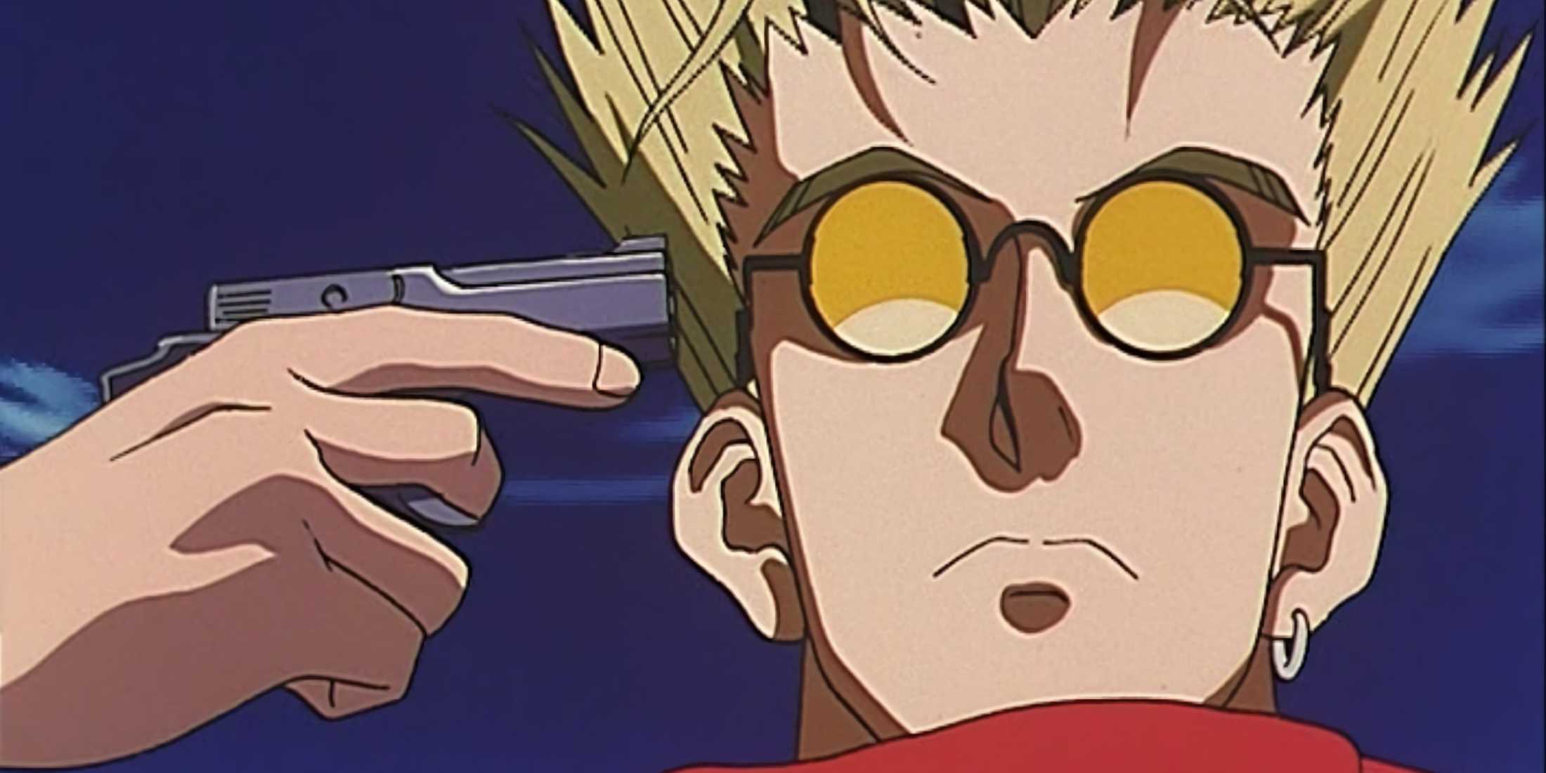 Vash pointing a gun at himself as he stares down at the human traffickers.