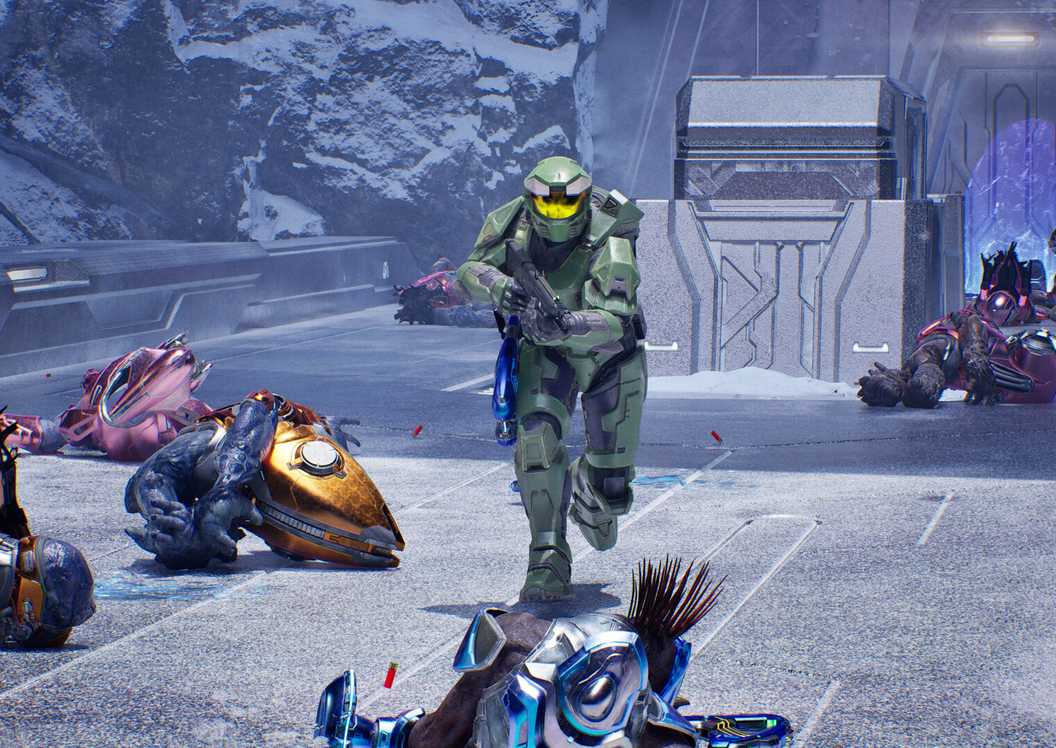 Master Chief amongst Covenant corpses in Halo: Campaign Evolved.