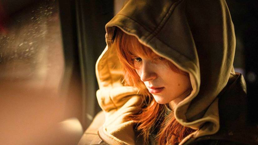 Jean Grey hides her face under a green and yellow hoodie in Spider-Man: Brand New Day 