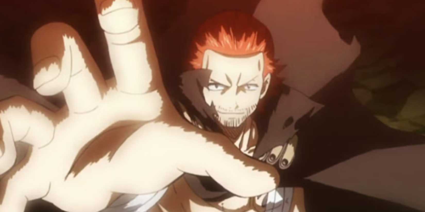 Gildarts happily blocks one of Natsu's fire spells in Fairy Tail.