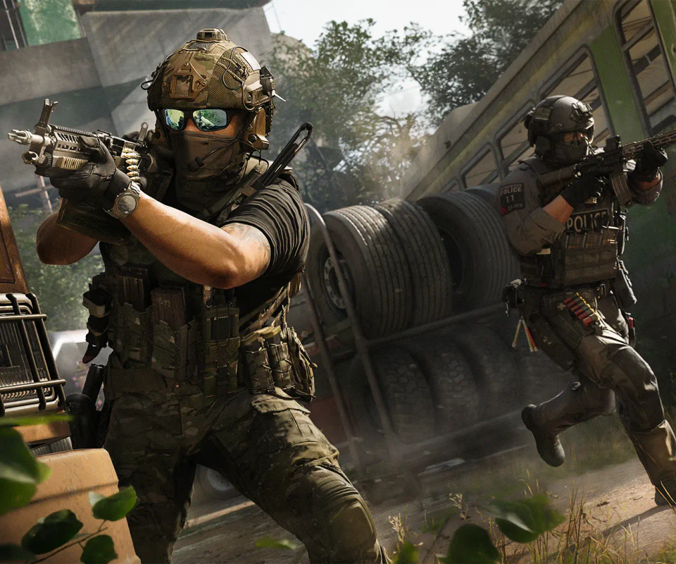 Two soldiers shooting their guns in an urban environment