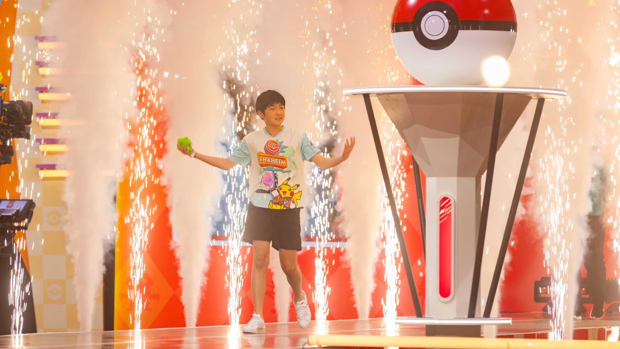 Pokemon World Championships player stepping out onto the stage with pyrotechnics
