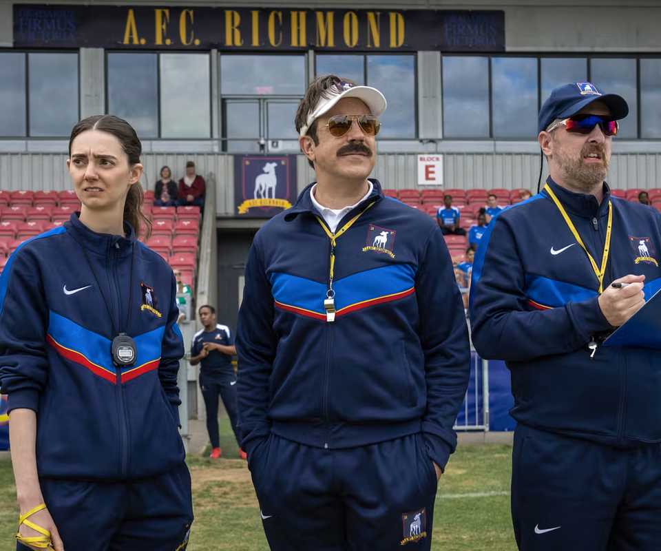 Ted Lasso Coach Beard and Coach Chilton on the pitch in Season 4