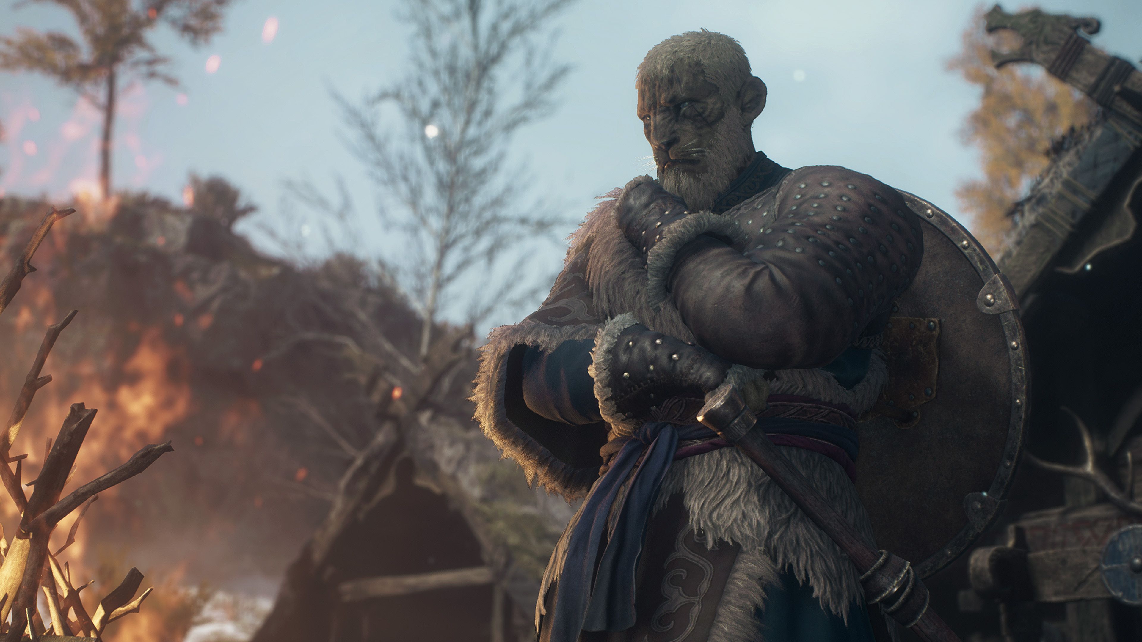 Beasatren standing by fire