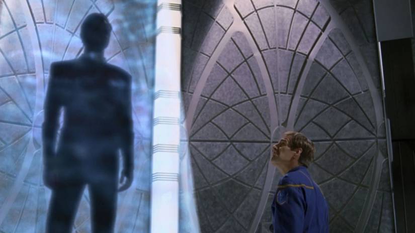Archer looks up at a shadowy hologram in Star Trek: Enterprise