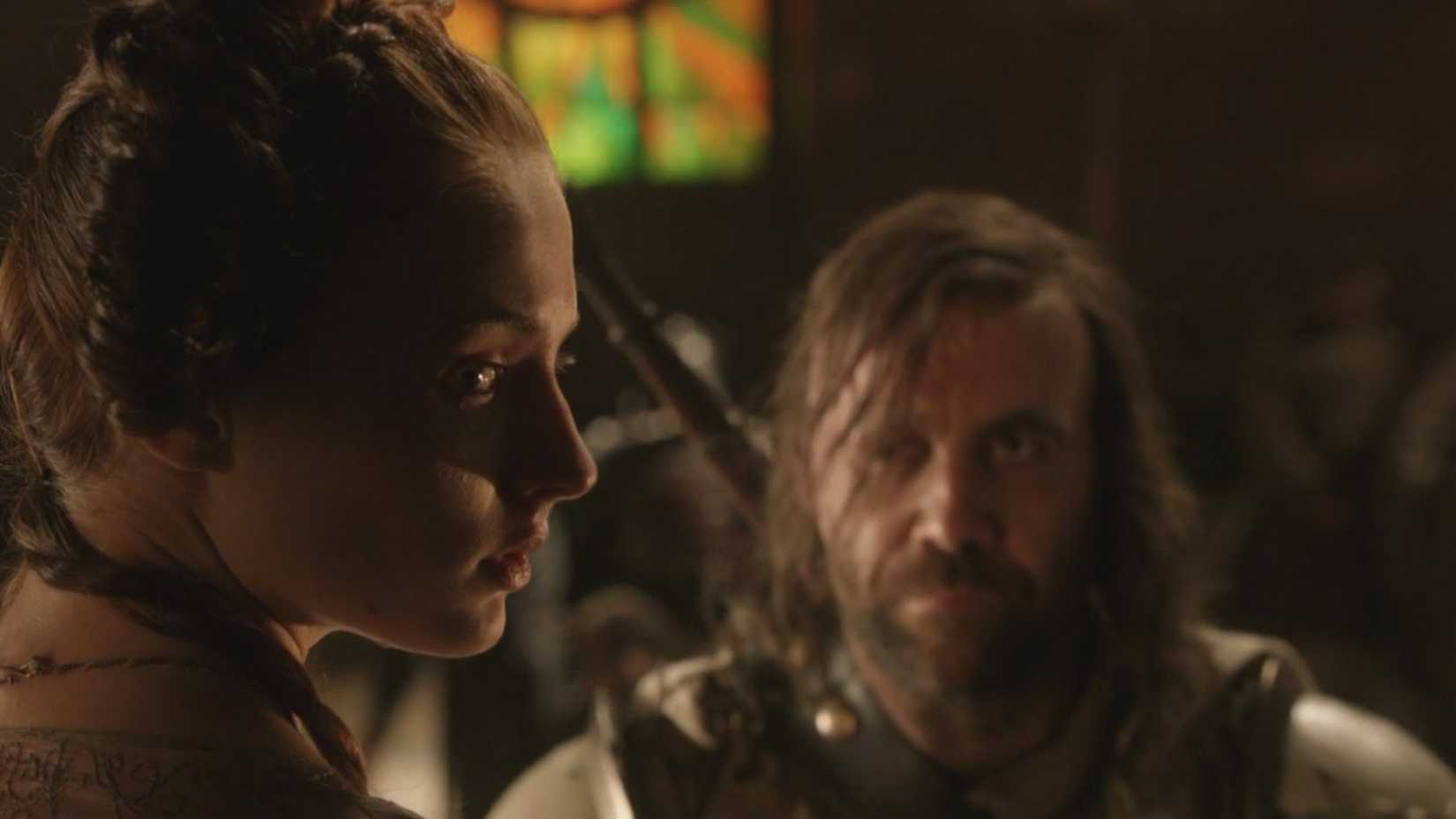 Rory McCann as The Hound and Sophie Turner as Sansa Stark in Game Of Thrones