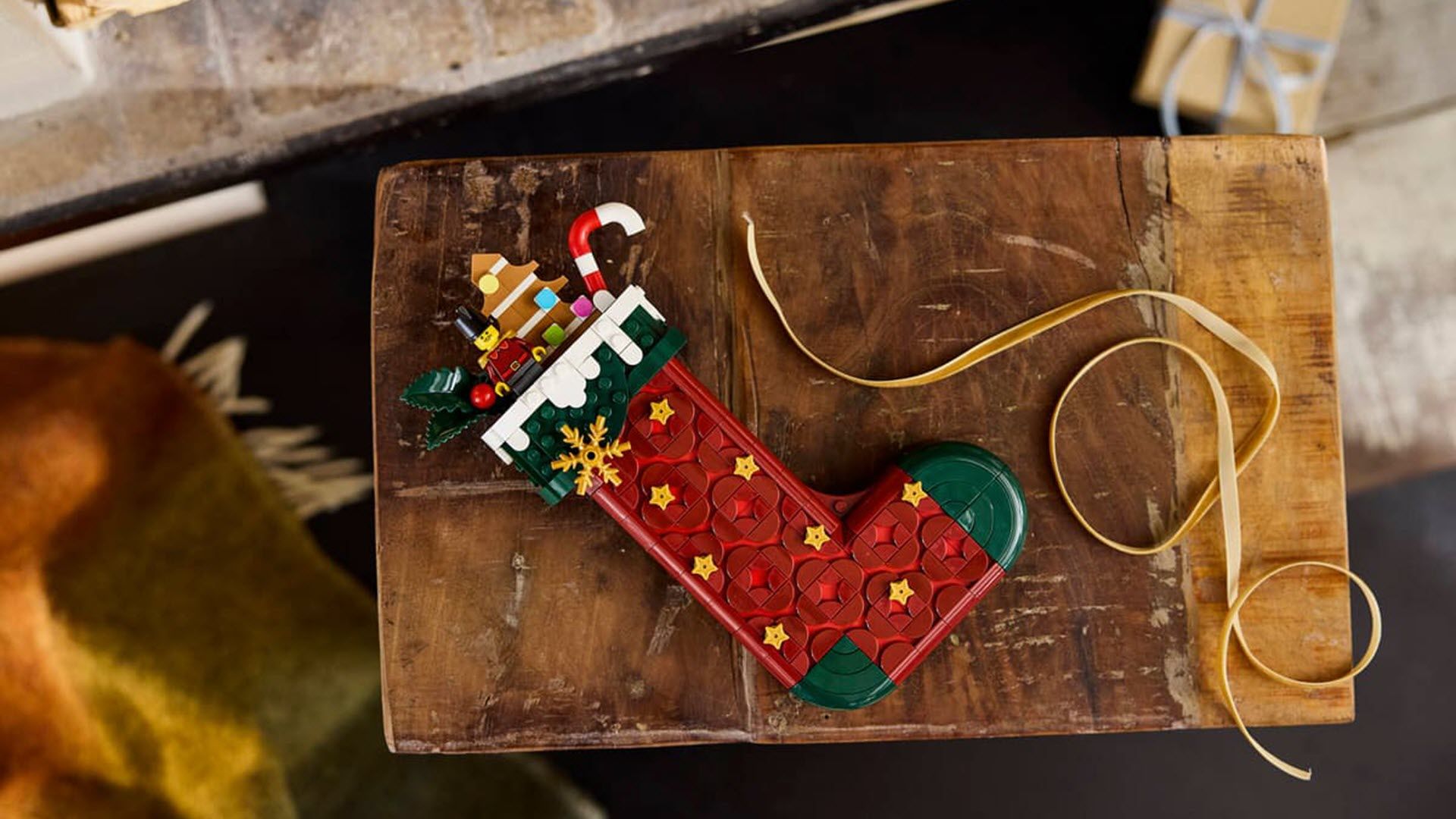 lego christmas stocking laying on a table