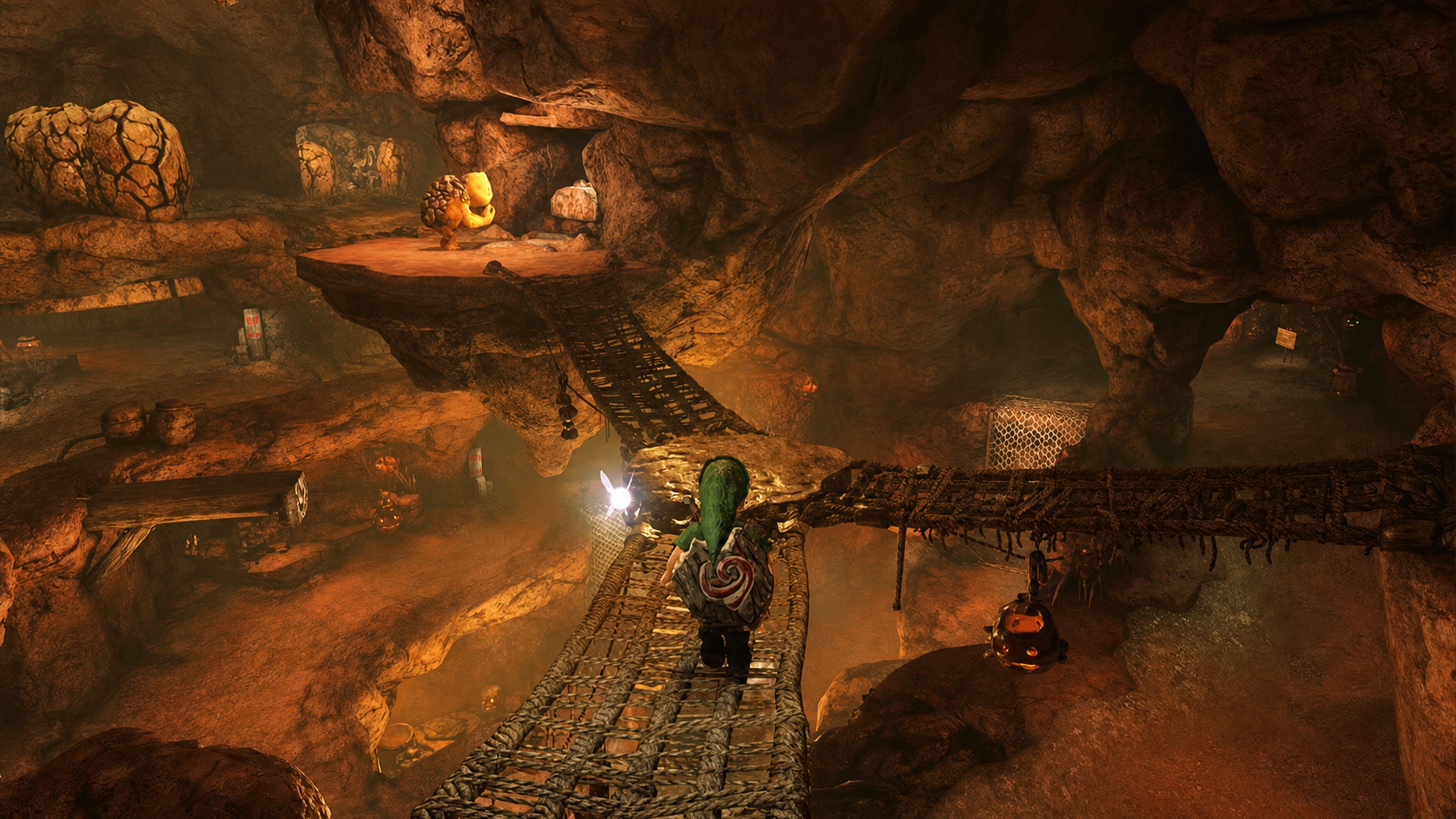 Link walking on a rope bridge in Goron City in the Zelda Ocarina of Time remake on Switch 2