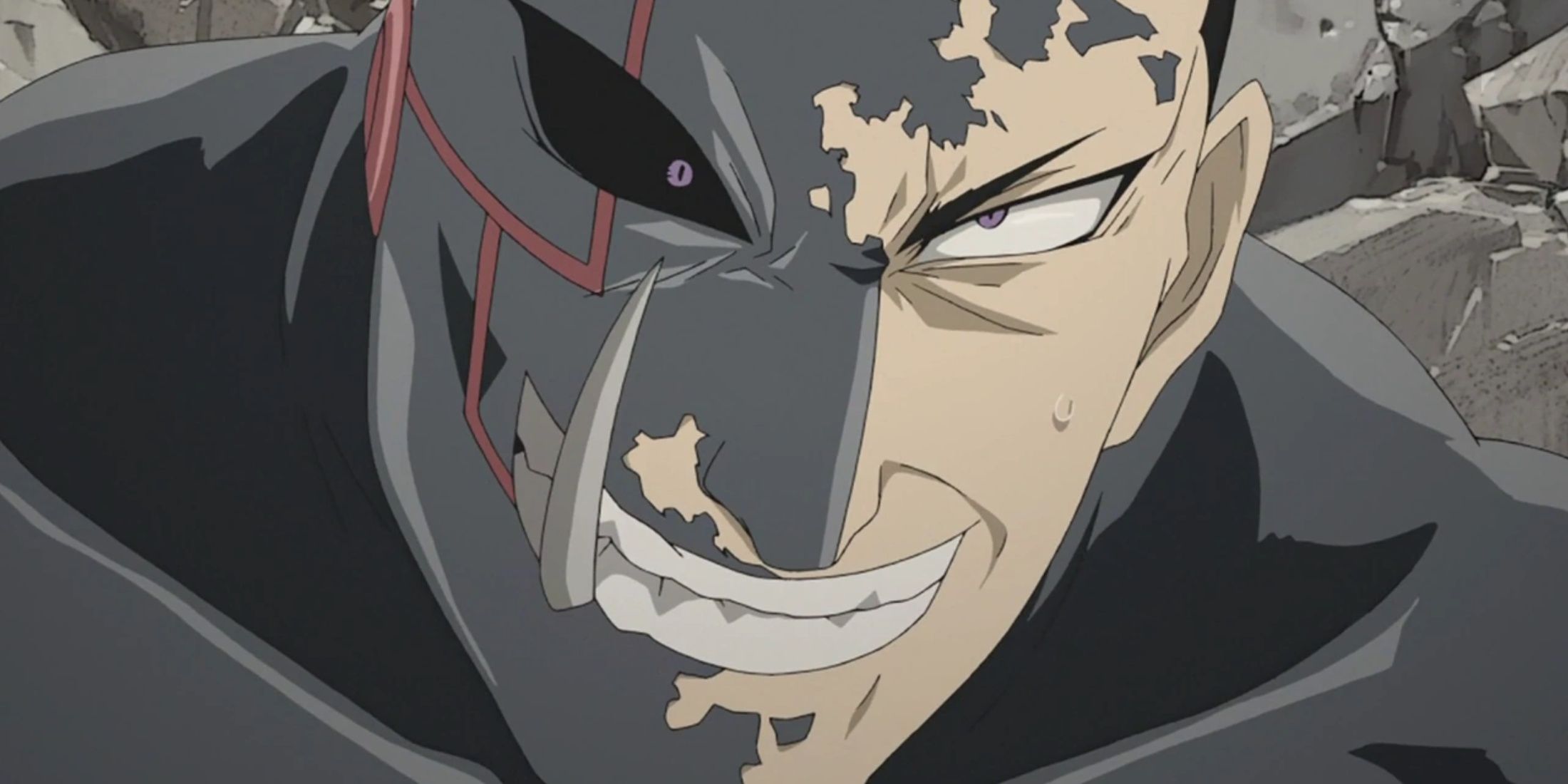 Greed smiles as he covers his body in armor while fighting Wrath in Fullmetal Alchemist: Britherhood.