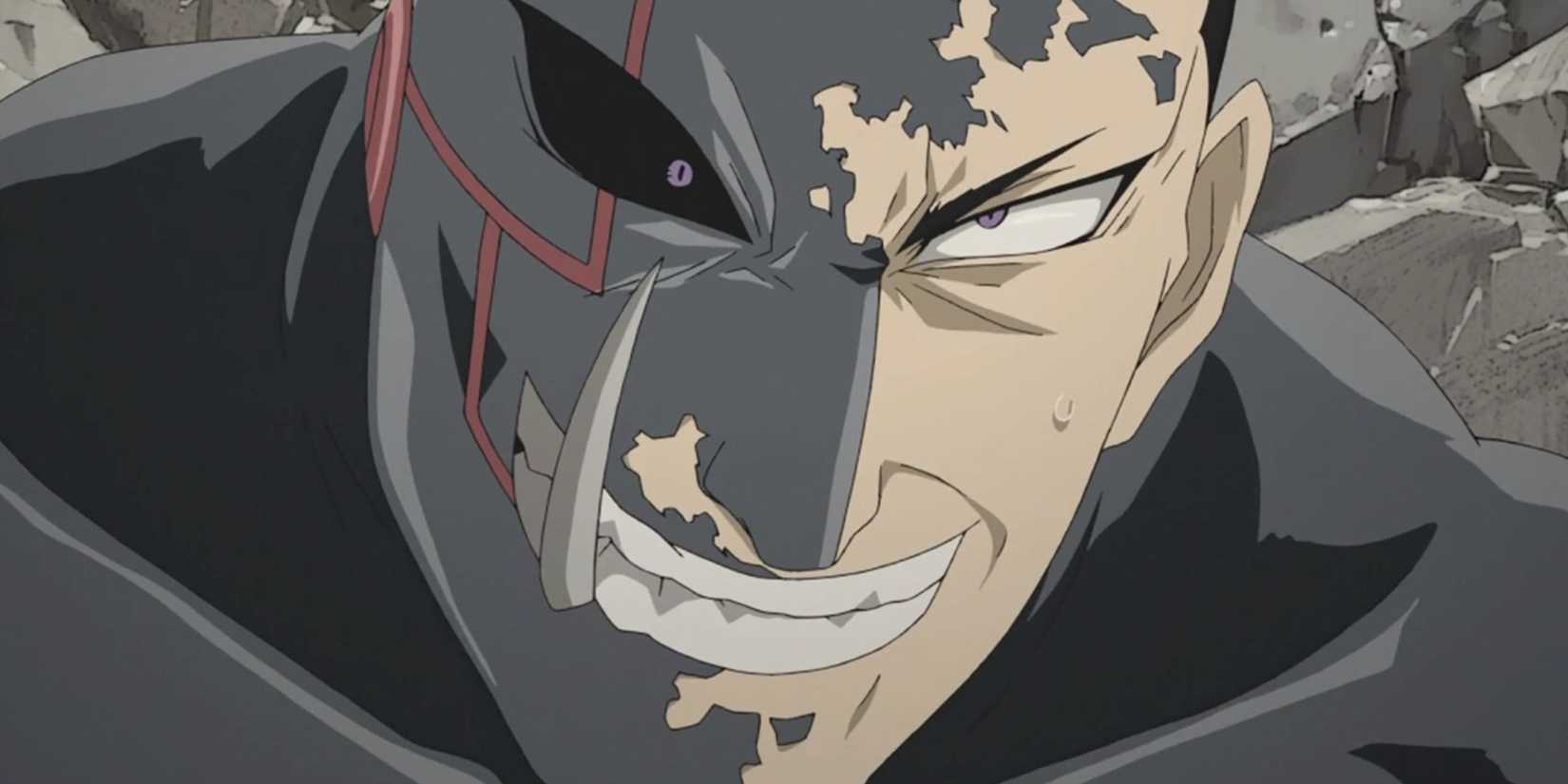 Greed smiles as he covers his body in armor while fighting Wrath in Fullmetal Alchemist: Britherhood.