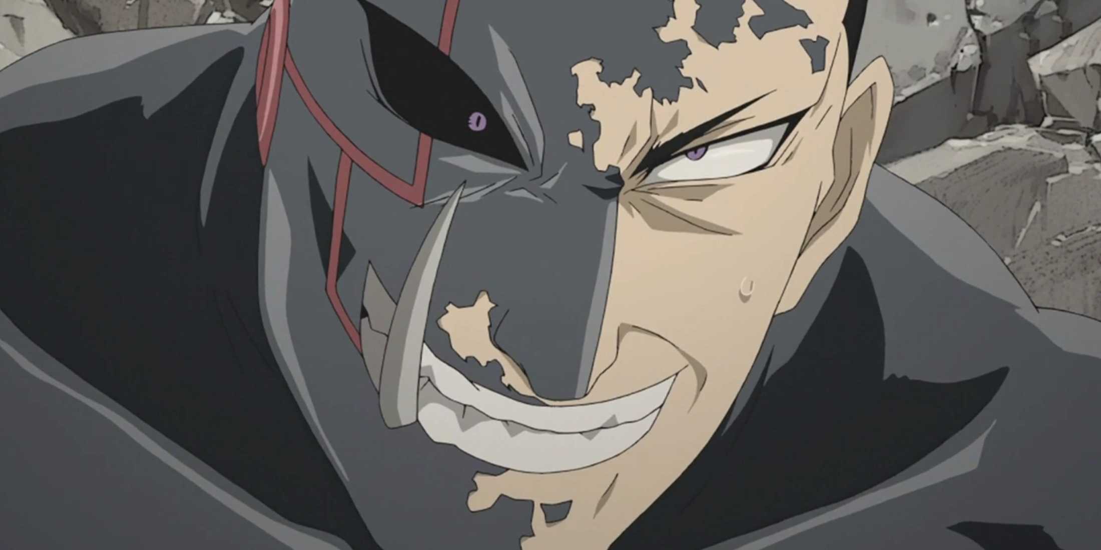 Greed smiles as he covers his body in armor while fighting Wrath in Fullmetal Alchemist: Britherhood.
