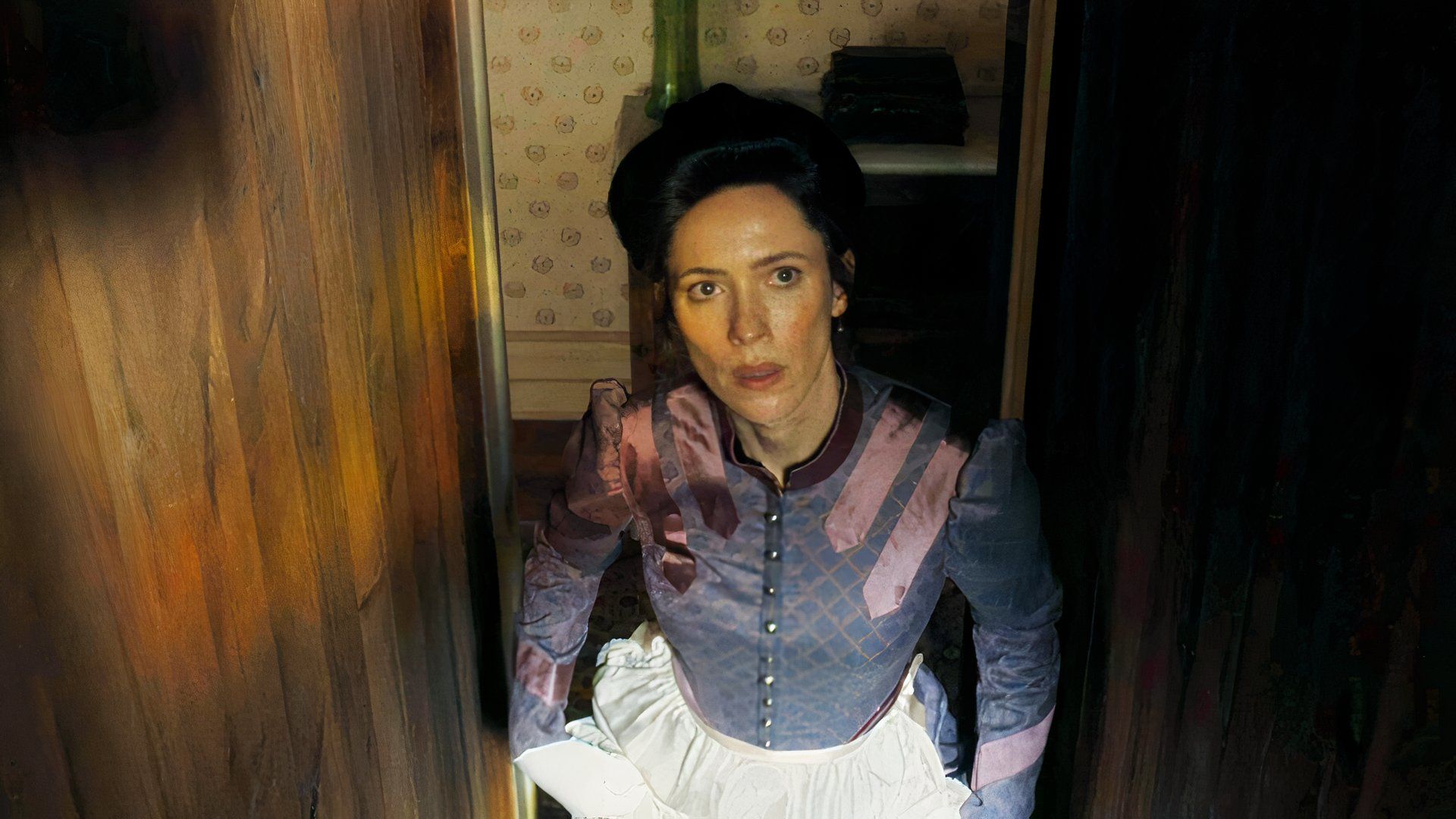 Rebecca Hall as Abby Borden in a blue dress in Monster Season 4