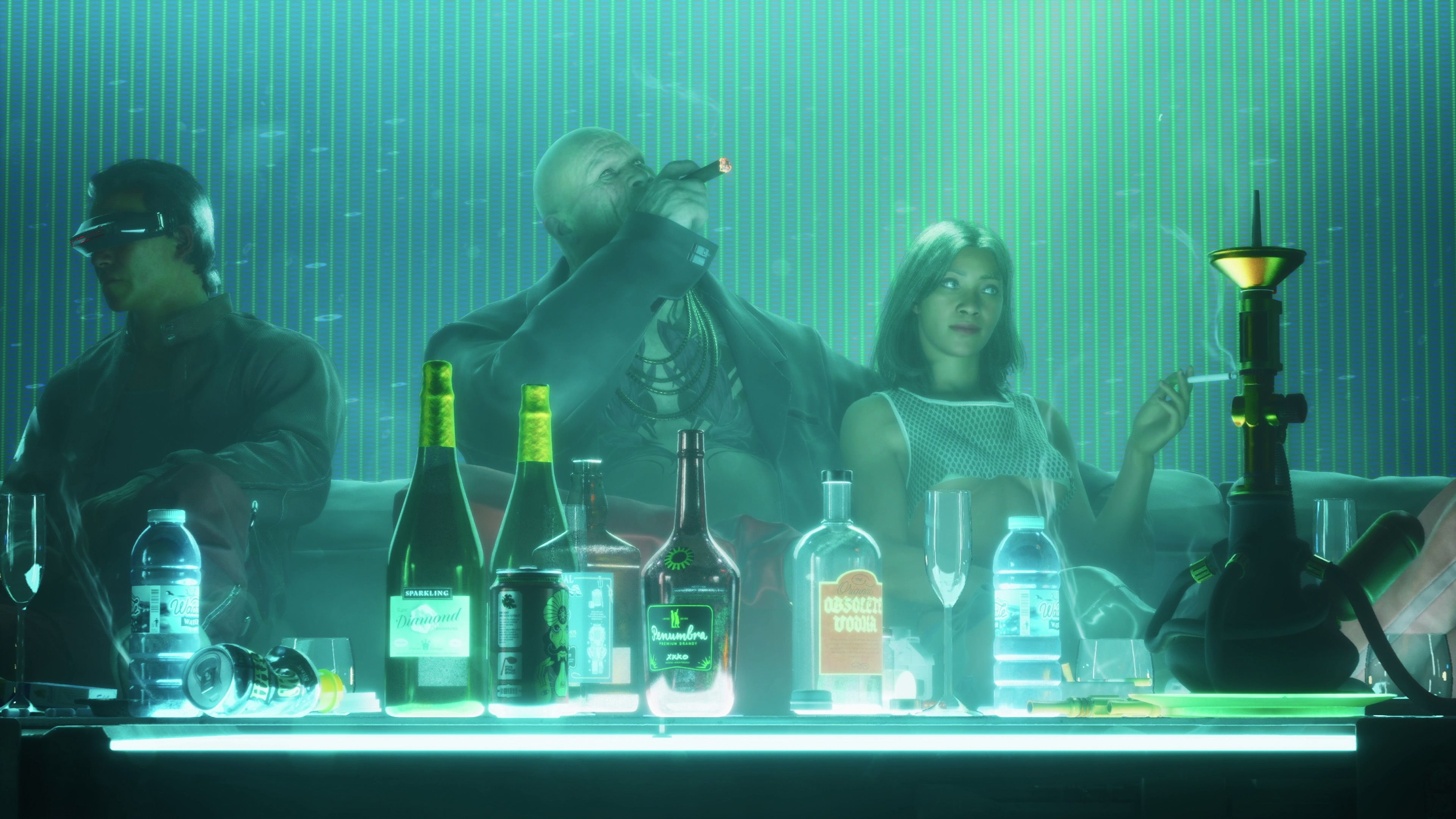 Man drinking at a table with a woman