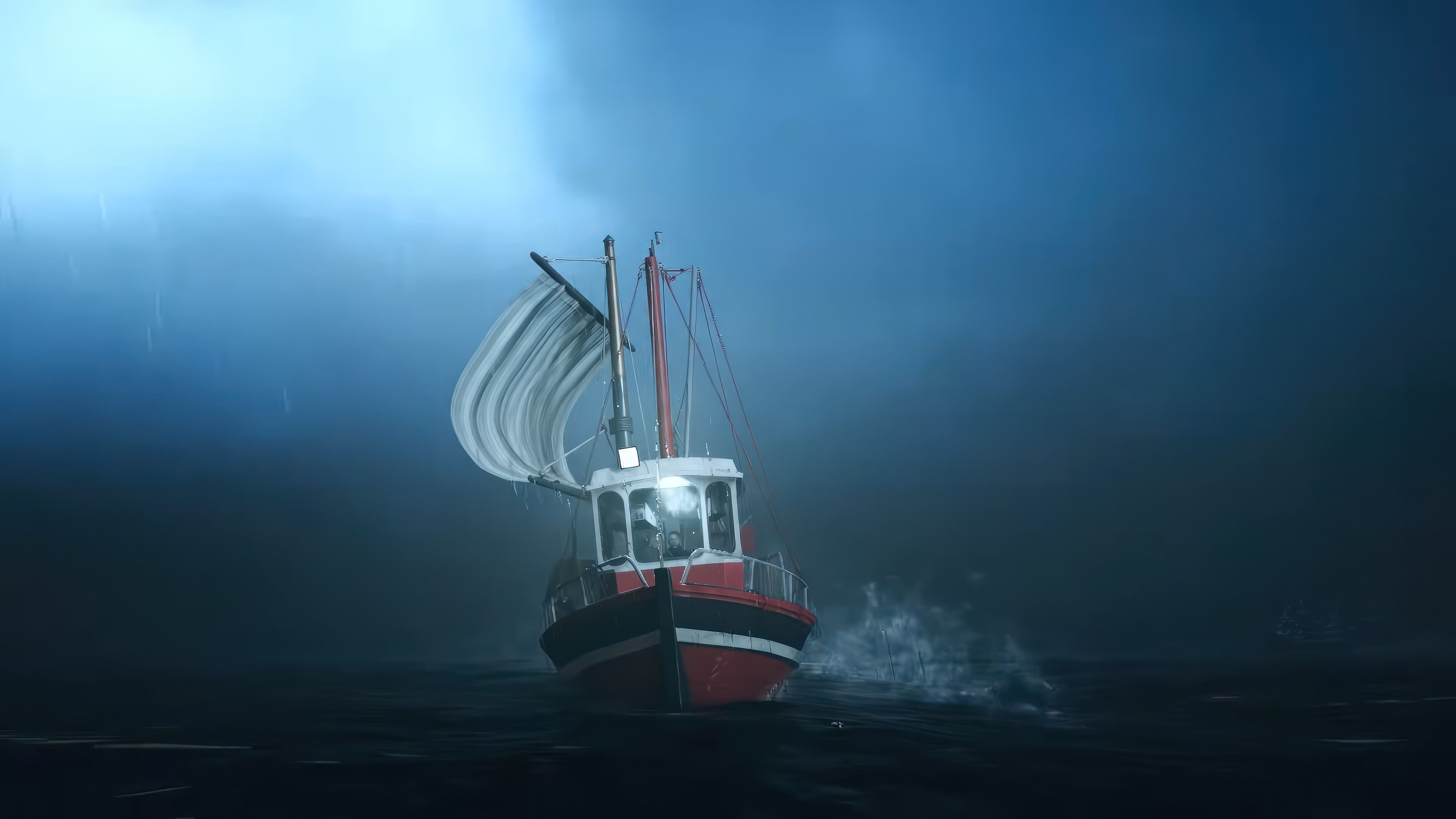 Small sail boat sailing on dark water