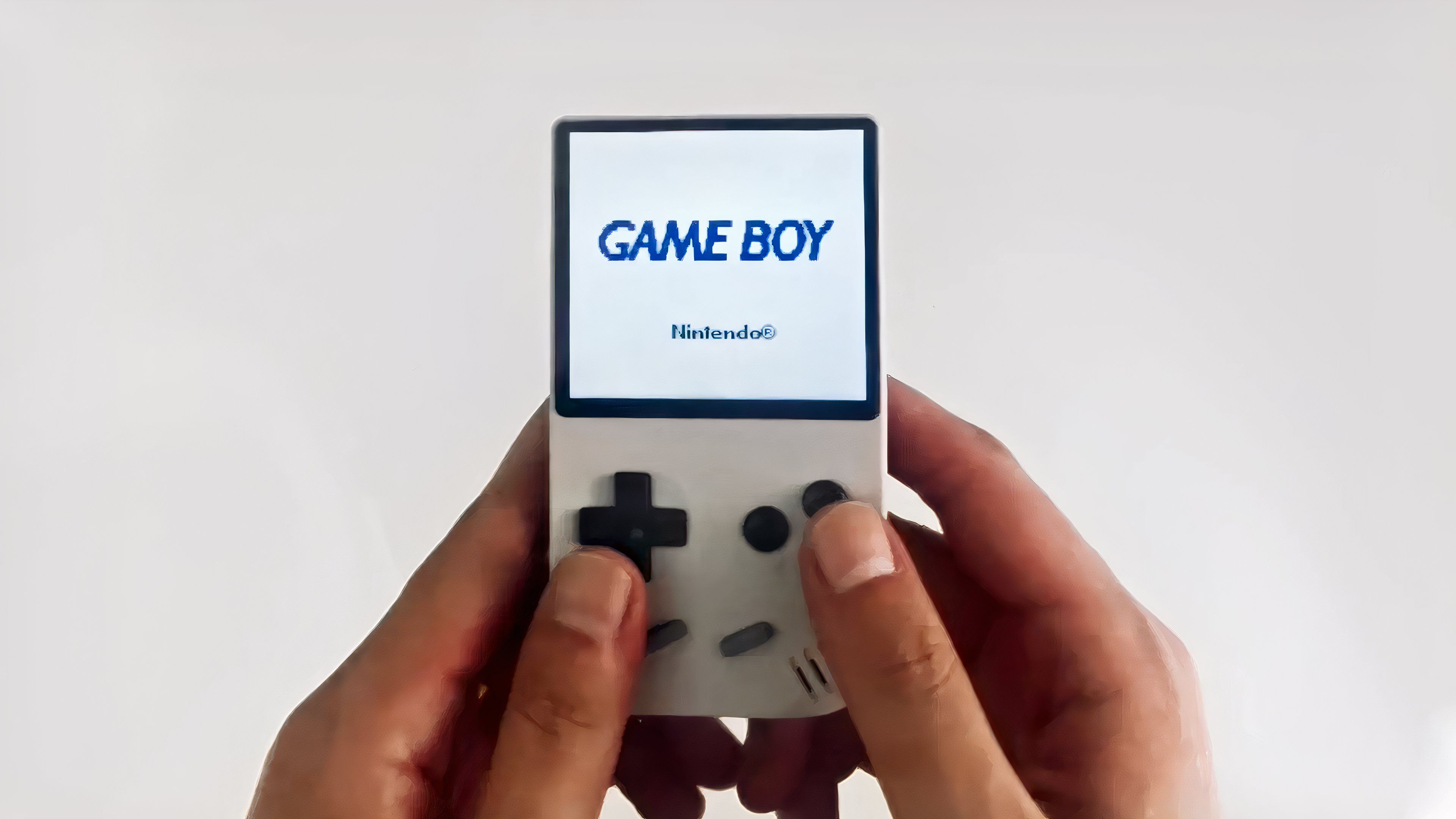 retro pixel minigb game rant 1 tiny console in someone's hands