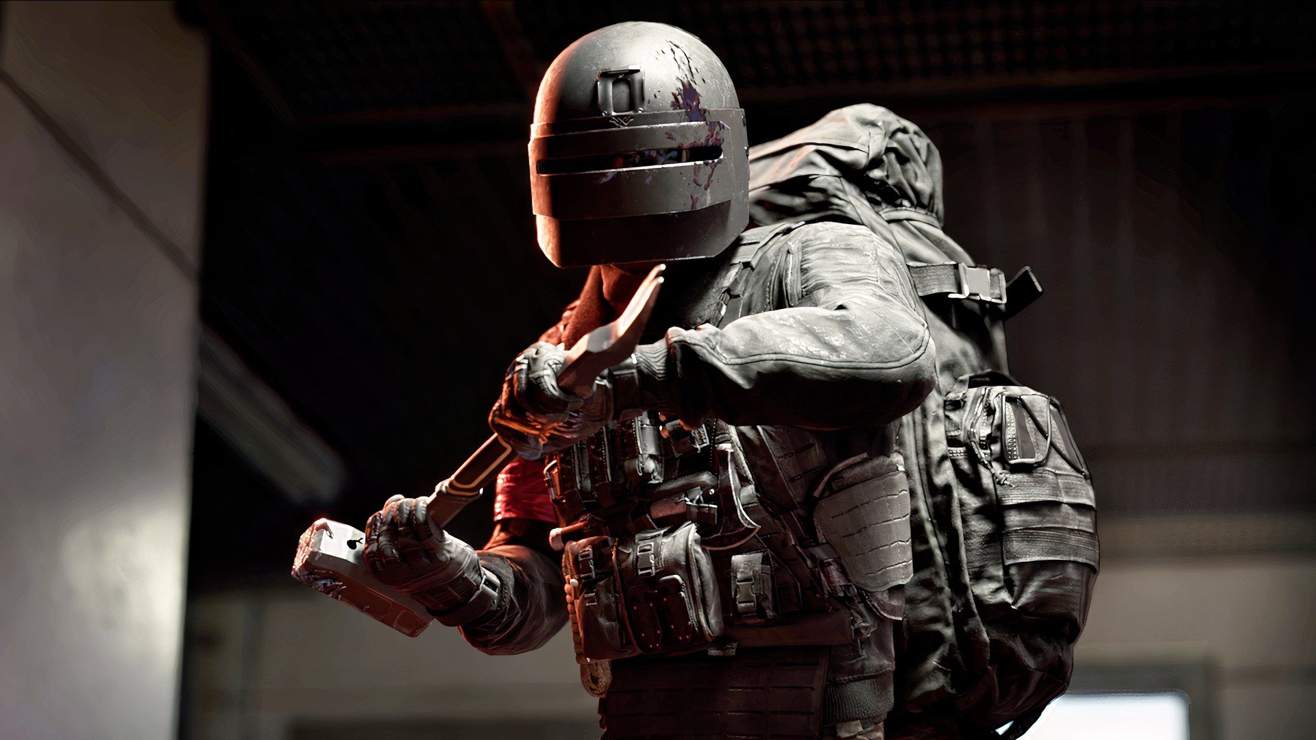 geared up operator in wardog about to breach a door.