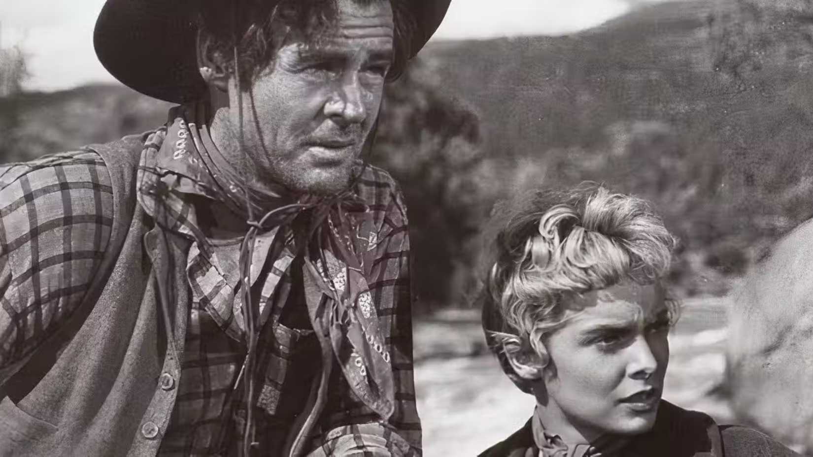 Robert Ryan as Ben Vandergroat and Janet Leigh as Lina Patch in The Naked Spur