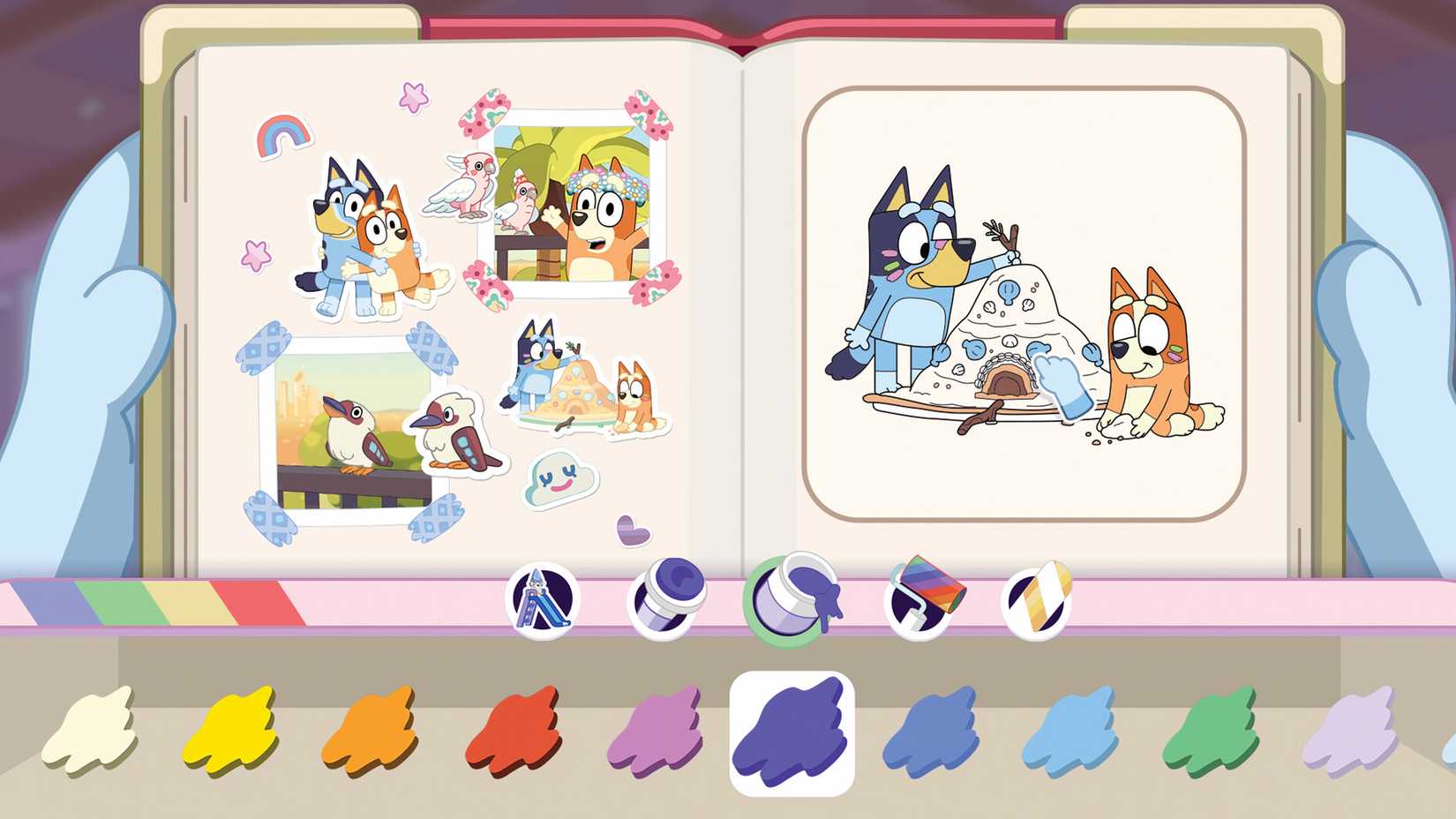 Bluey's Happy Snaps scrapbook customization screen shows family photographs, stickers, and a coloring activity featuring Bluey and Bingo building a sandcastle