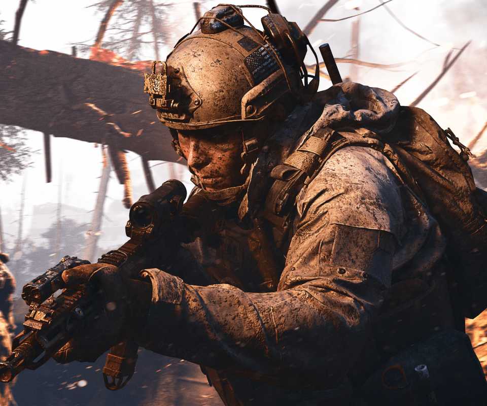 Call of Duty Modern Warfare 4 player with rifle covered in mud in forest cropped screenshot