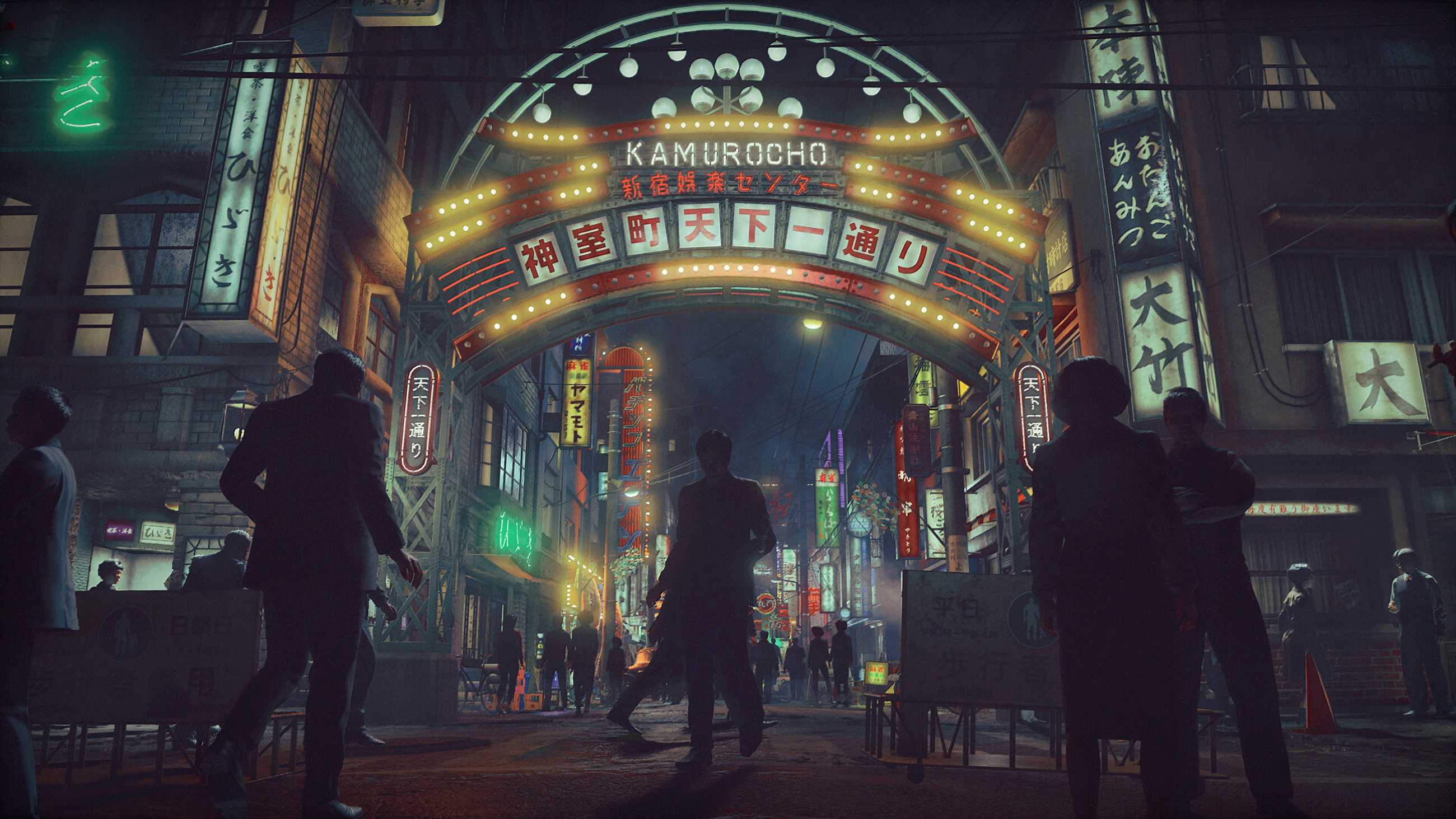 Crowds walk beneath the illuminated Kamurocho entrance arch surrounded by neon signs and storefronts at night in Stranger Than Heaven