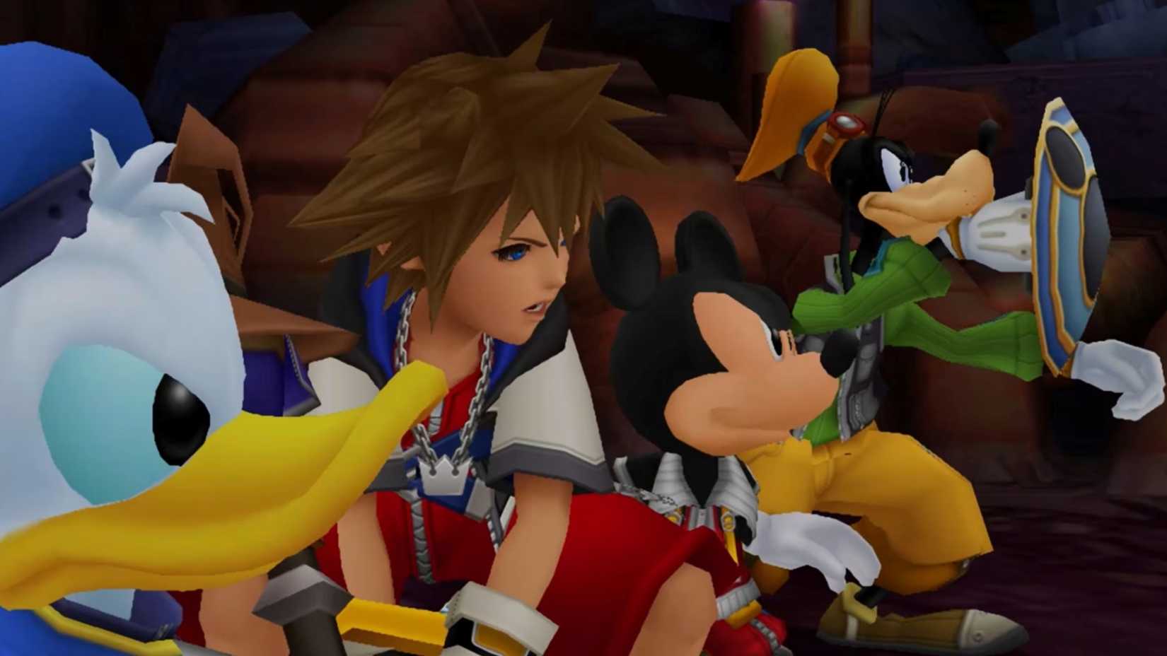 An image from Kingdom Hearts Collection [1~3] featuring Donald, Sora, King Mickey, and Goofy facing off against an off-screen enemy.